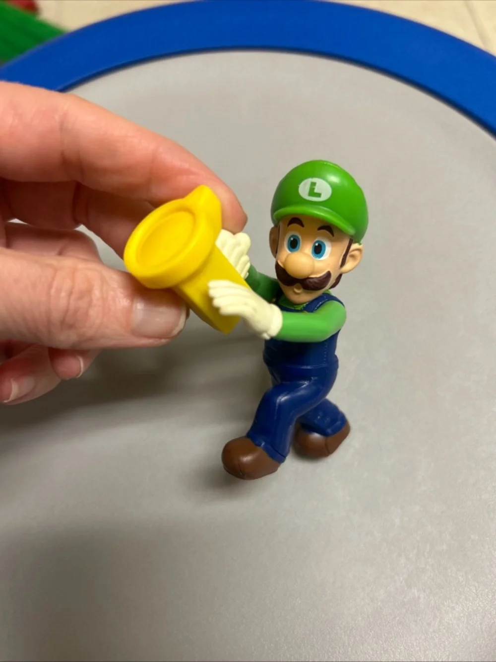 Nintendo Green and Blue Plumber Action Figure with Yellow Accessory